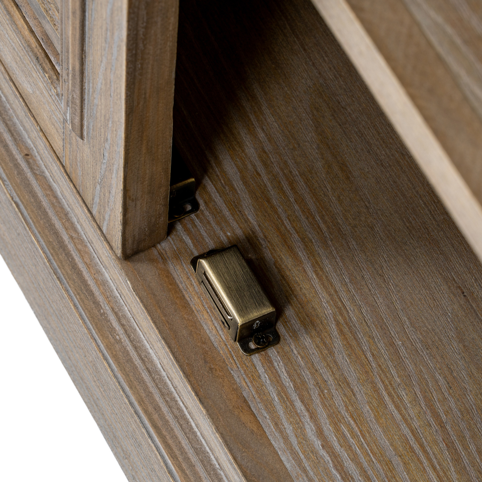 Image shows a close up of the door closure features of a storage chest
