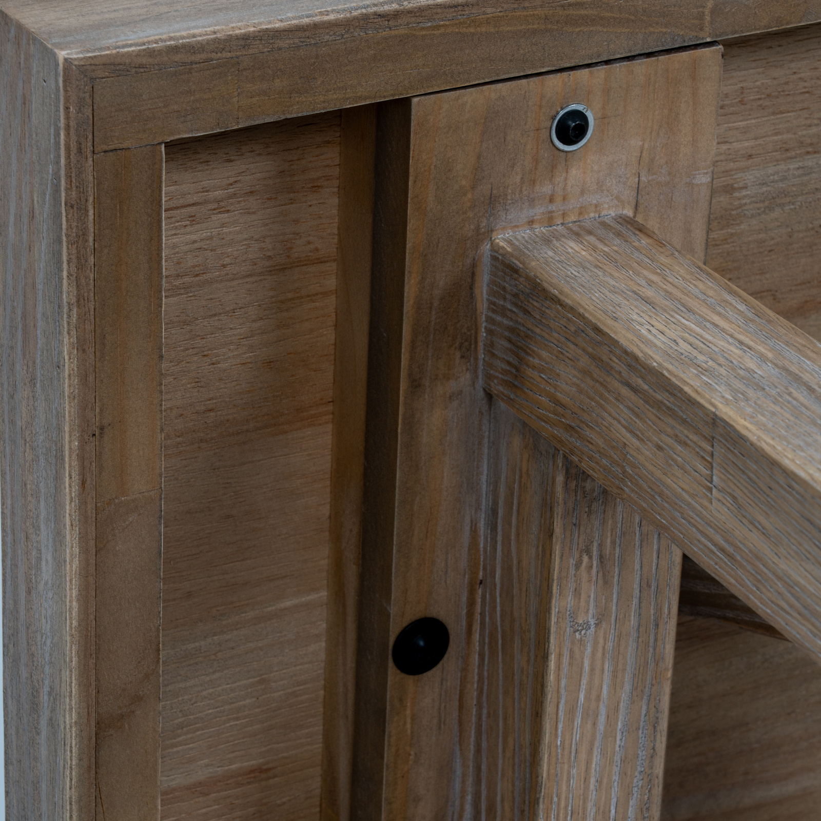 Image shows a close-up view of the underside of a console table, showing how the legs are fixed to the top